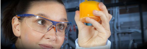 A food scientist studies an interesting mixture of food-grade chemicals.