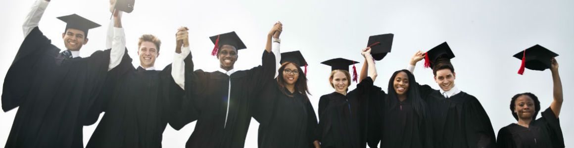 diverse group of grads celebrating graduating from college