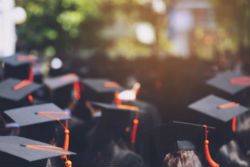 a sea of graduation caps